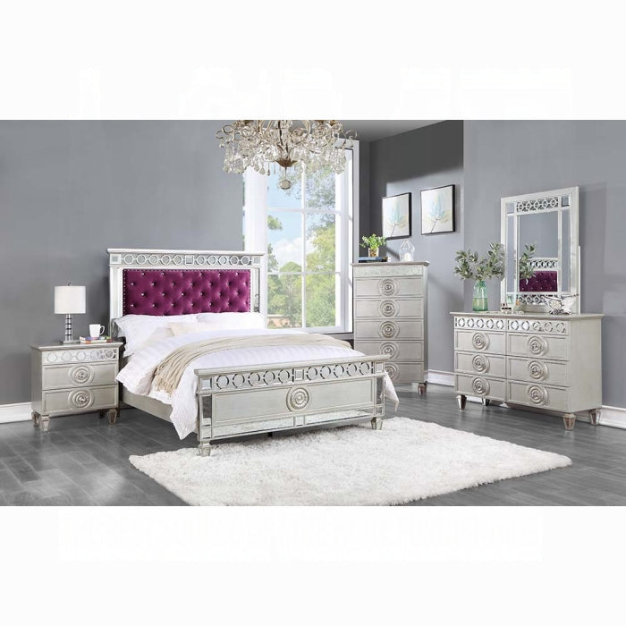 Burgundy velvet upholstered twin bed