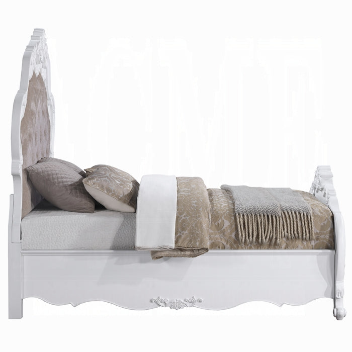 Button-tufted headboard with carved frame