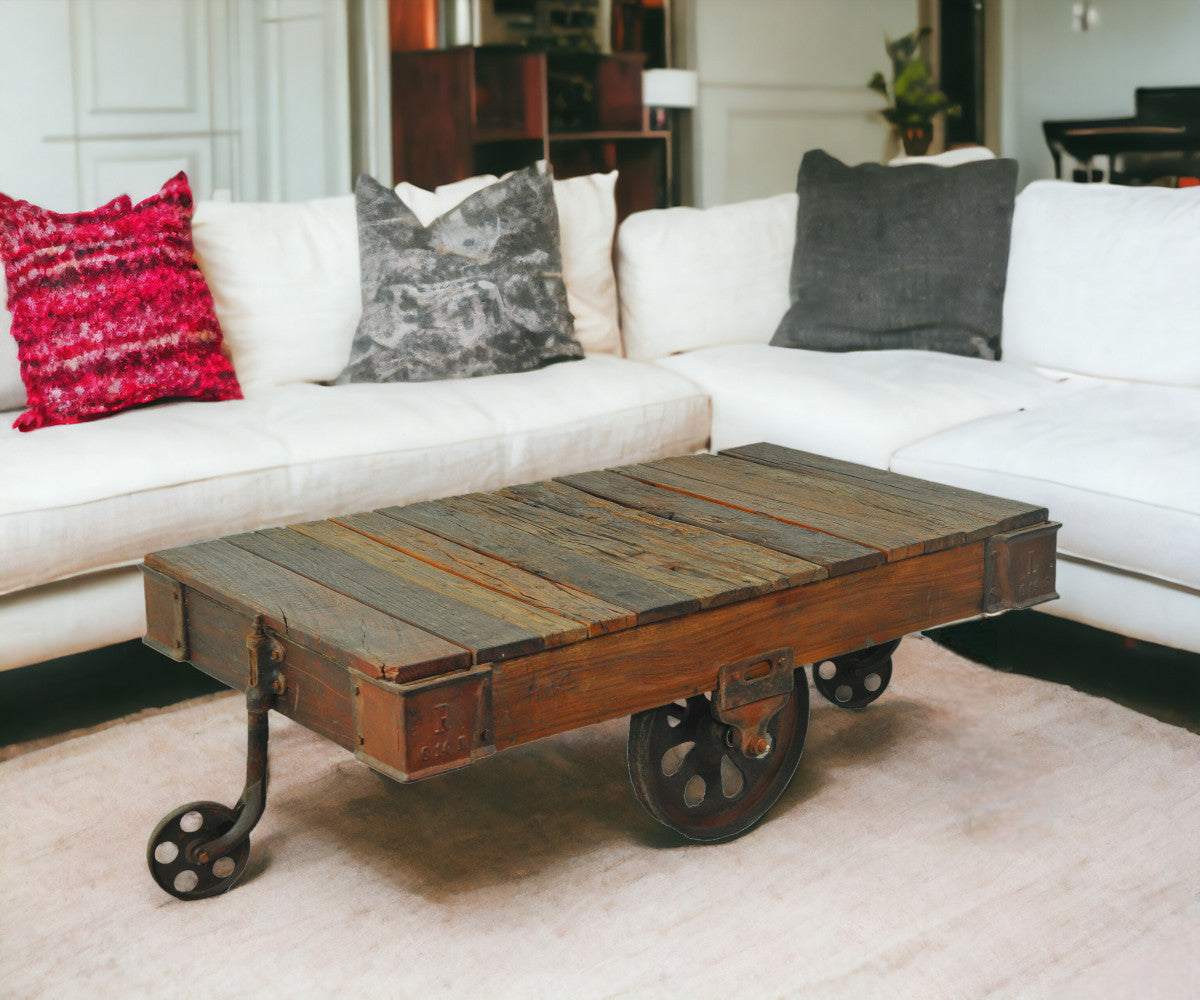 50" Brown and Black Solid Wood and Iron Distressed Wheel Coffee Table-1